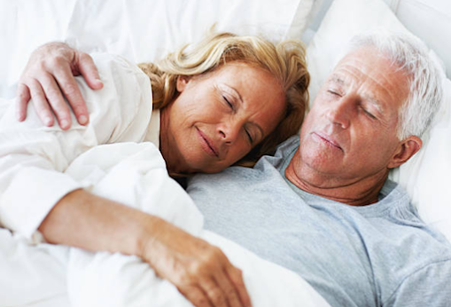 Couple sleeping peacefully through the night